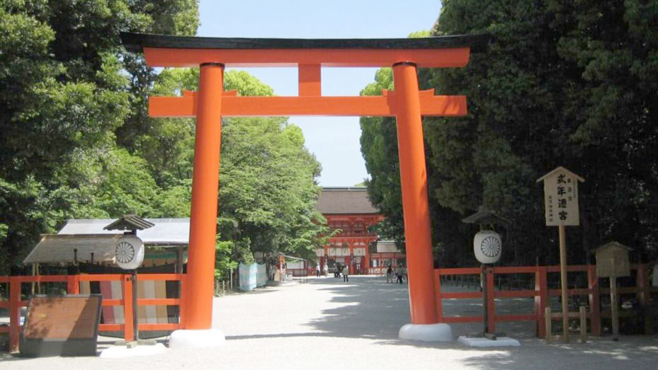Torii and building and Shimogamo Shrine